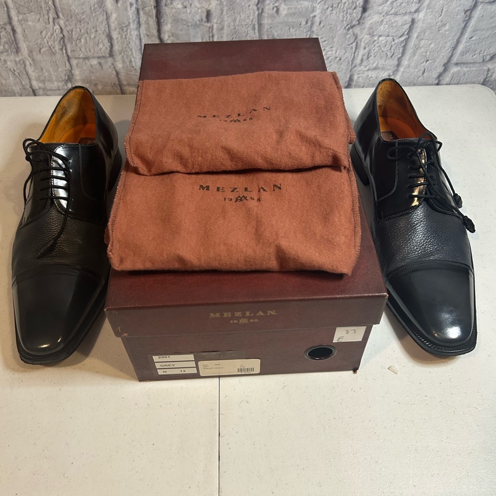 Gray leather shoes made by Mezlan